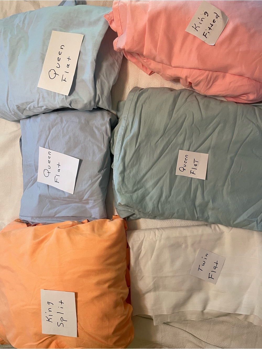 Sheets Blue, Pink, Green, Peach, and White